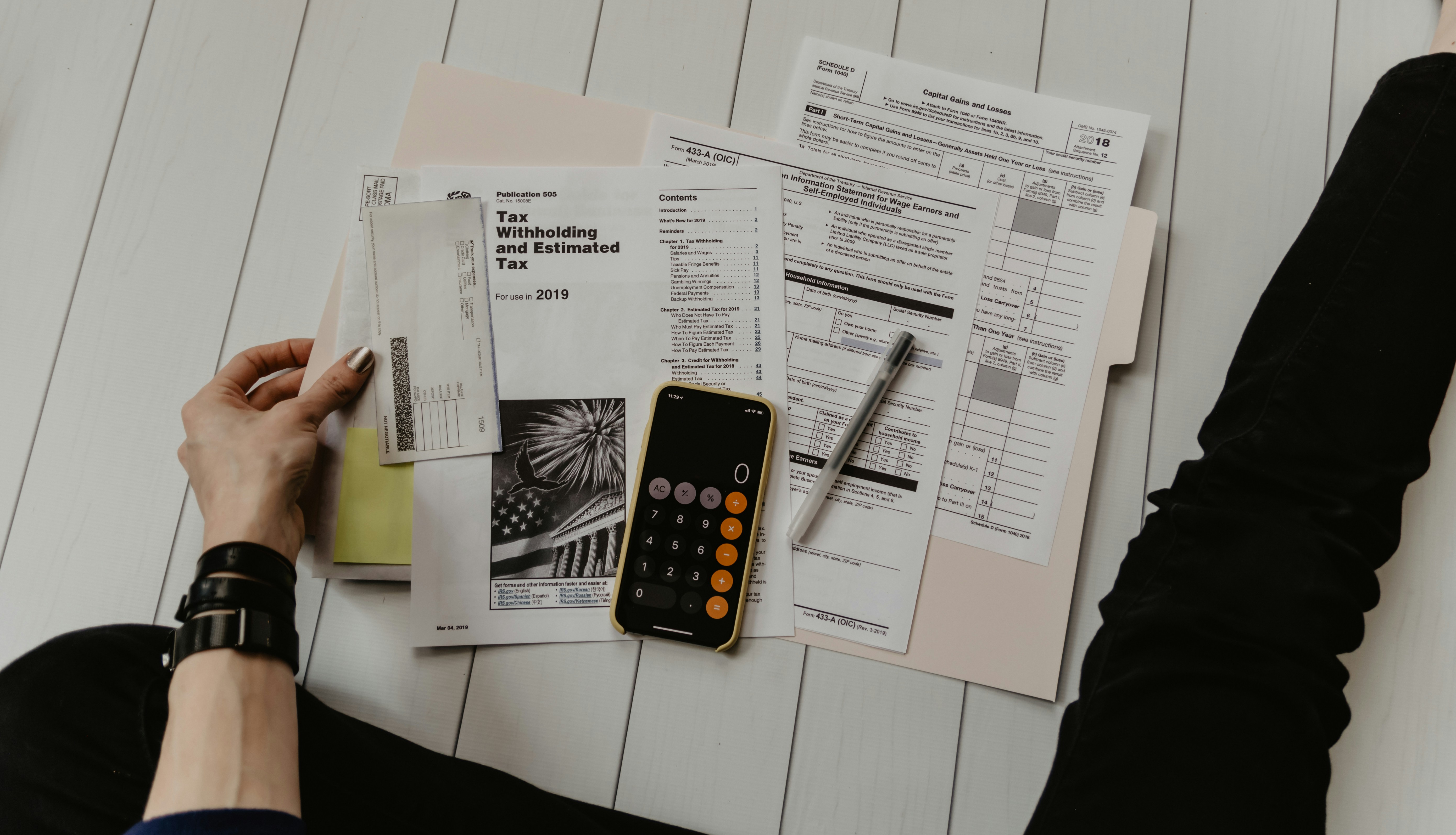 Business professionals reviewing rebate documentation